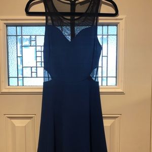 Lush blue and black illusion neckline dress